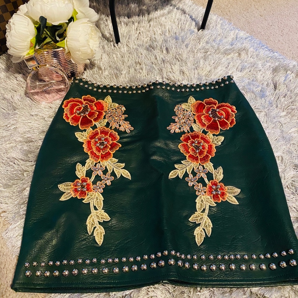 Studded leather mini skirt